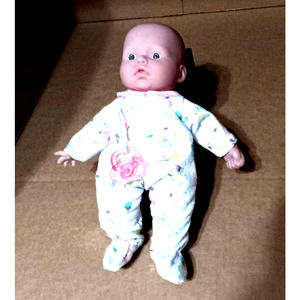Berenquer doll in pajamas with pacifier